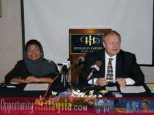 Press Conference held at the Sheraton Imperial Hotel November 26, 2004Rosnah Majid, CEO - Electronic Business Management Sdn Bhd, Bernhard Schutte, Chairman of Asia Committee USA