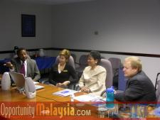 Captain Winston Scott gives a presentation of Florida Space AuthorityCaptain Winston Scott, Executive Director of the Florida Space Authority, Margo Witcher, Communications Manager of Florida Space Authority, Dato' Rosnah Majid, CEO of Electronic Business Management (EBM),  Bernhard Schutte, Chairman of Asia Committee USA.