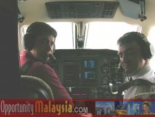 In the air with the Pilatus P12.From left to right: Pilot: Chad Leeward. Co-Pilot Thomas Bernthaler CTO of Digital Media Network.