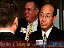 Group Photo of: Thomas Bernthaler, Bob Swindell, and John Diep.From Left to right: Thomas Bernthaler, CTO of Digital Media Network (DMNI), Bob Swindell, Director of Marketing for the Broward Alliance and John Diep, Director of Asia and the Pacific Region of Enterprise Florida.