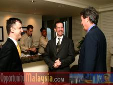 Group Photo of: Thomas Bernthaler, Dan Clark and John McCartneyFrom Left to right: Thomas Bernthaler, CIO of Digital Media Network (DMNI), Dan Clark, food and beverage manager of the Atlantic Hotel and John McCartney, Director for Florida, U.S Department of Commerce.