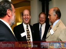 Jim Tarlton, Ken Haiko, Bernhard Schutte and John Bauer talking about the business opportunities in Malaysia.From Left to right: Jim Tarlton, President & CEO of the Broward Alliance, Ken Haiko, Chairman, Board of Supervisors of Florida Space Authority, Bernhard Schutte, Chairman of Asia Committee USA and Consul John Bauer, President of Basic Food International. 
